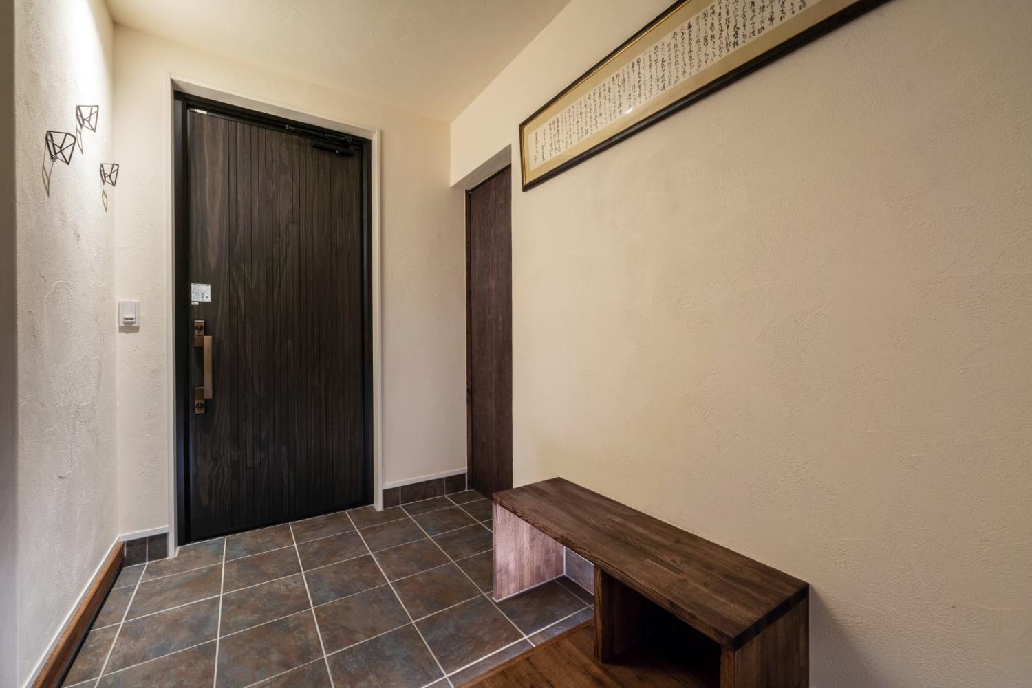 和モダンで統一された癒しの玄関ホール