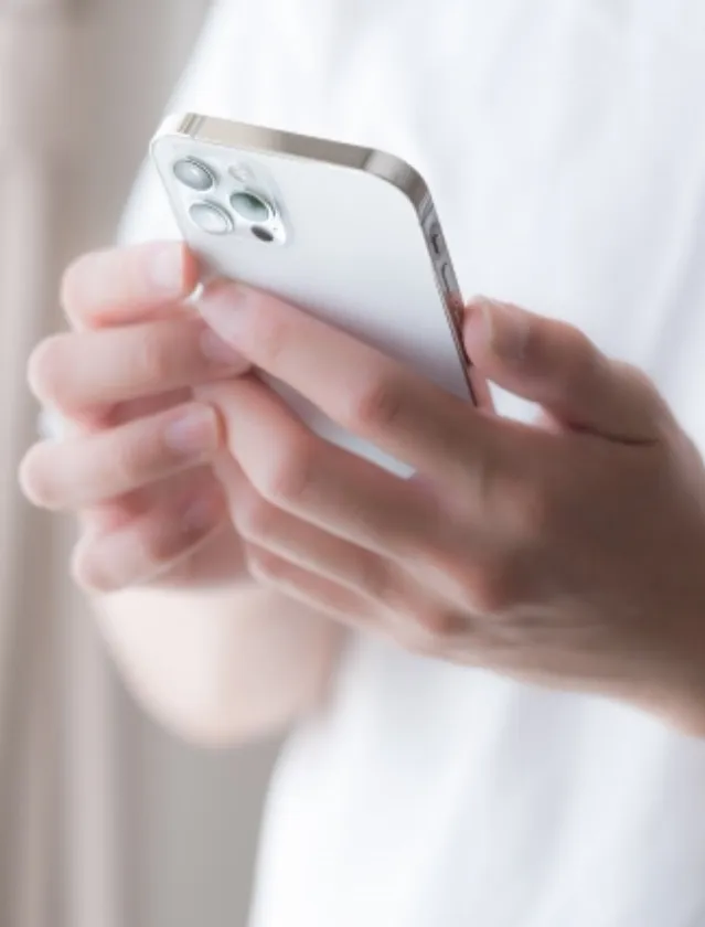 写真:スマホで問い合わせ